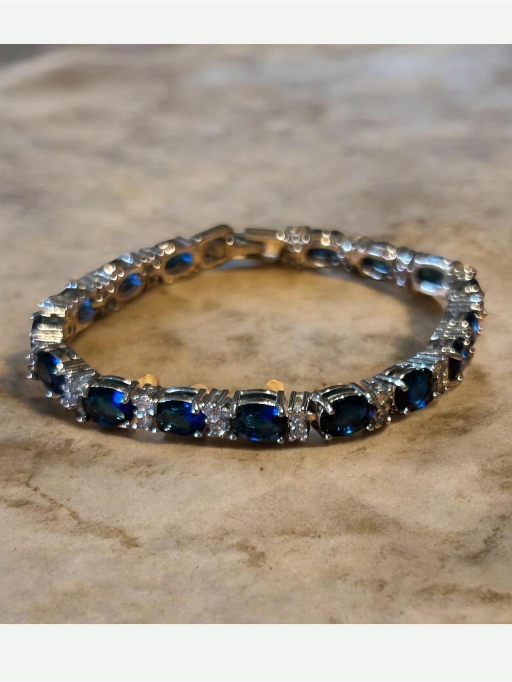 Vintage Fold Over Clasp Sterling/Rhodium Plated Blue Glass Tennis Bracelet